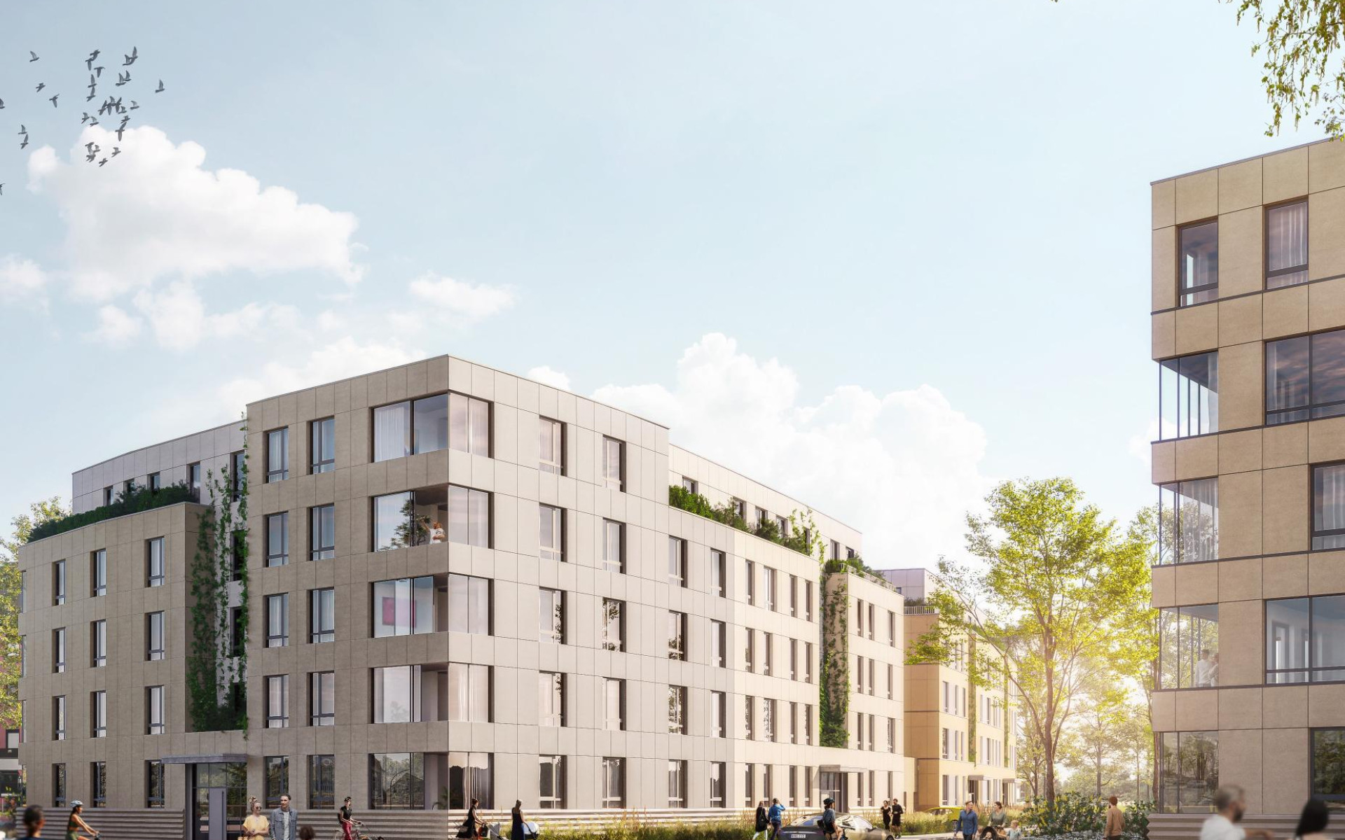 Moderne Wohngebäude mit grünen Fassaden, belebt von Passanten und Radfahrern unter blauem Himmel.